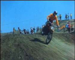He played an uncredited role wearing a helmet as a motorcyclist in the B-movie 'Dixie Dynamite.'